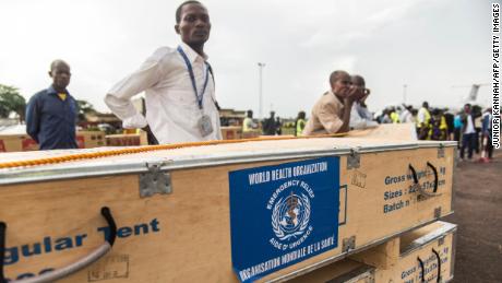 A health official supervises World Health Organization medical supplies at the airport in Mbandaka, Congo.