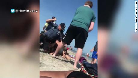 Police officer punches woman in New Jersey beach arrest video