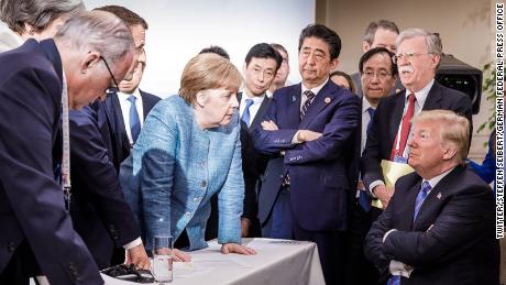 Heads of state of G7 nations peer down at Trump during the summit in Canada.