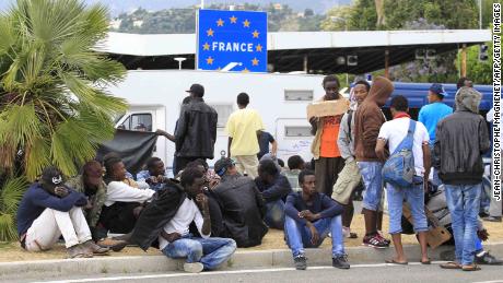 French police seize SIM cards, cut soles from shoes of child migrants, report claims