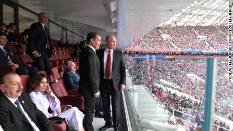   Putin and Prime Minister Dmitry Medvedev attend the opening ceremony of the World Cup. 