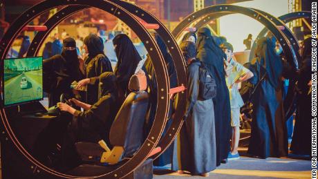 Women take part in a government-organized road safety event at Riyadh Park Mall, in the Saudi capital, on Thursday.