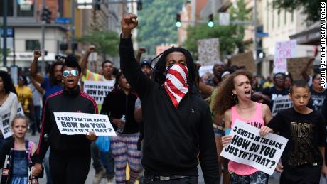 Trey Willis, 32, of Washington, Pennsylvania, marches during a Tuesday protest in downtown Pittsburgh.