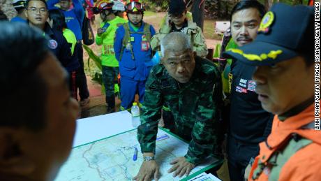   Thai officials plan a map of the Tham Luang Nang caves. The Tham Luang Nang Caves 