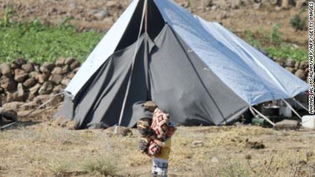   A Syrian child displaced from Daraa province in a makeshift camp in the border area between the Golan Heights and Syria on Wednesday. 