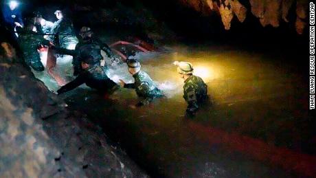   Thai rescue teams walk into the cave on Monday, July 2nd. 