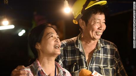   Family members celebrate after hearing everyone trapped in the cave. 