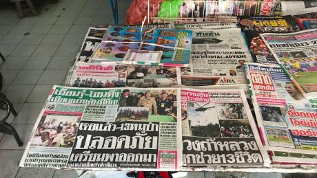   Thai newspapers lead with news that rescuers I made contact with the boys and their coach. 