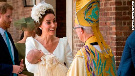 The Duchess of Cambridge speaks to Archbishop of Canterbury Justin Welby as she arrives carrying Prince Louis for his christening service.