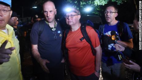   Three British divers, Rick Stanton, Robert Harper and John Volanthen arrive at the non-forest park of Khun Nam Nang near Tham Luang Cave in Chiang Rai on June 27, 2018. 