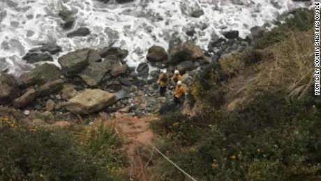   Emergency personnel used ropes to pull the woman down the cliff. 