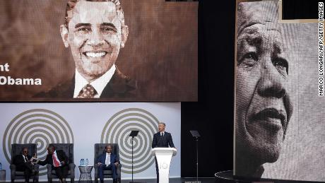 Obama speaks during the 2018 Nelson Mandela Annual Lecture at the Wanderers cricket stadium in Johannesburg on Tuesday.