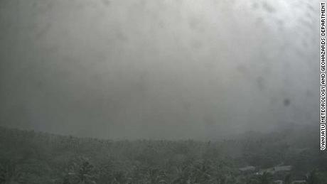 A shot from a government-run camera on Ambae shows the sky almost completely obscured by falling ash.