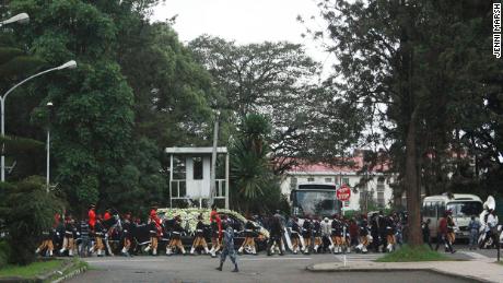   The funeral procession of Simegnew Bekele passes the Ministry of Foreign Affairs in Addis Ababa 
