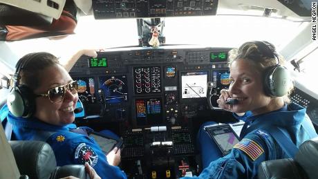 Waddington and Twining in the cockpit of the Gulfstream IV jet they flew toward Hurricane Hector.