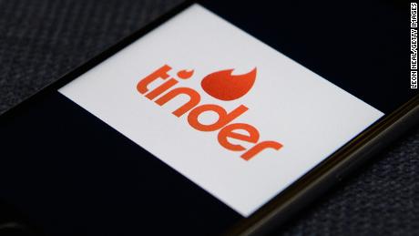 The &quot;Tinder&quot; app logo is seen on a mobile phone screen on November 24, 2016.