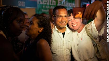Rep. Keith Ellison poses for a selfie with Jennifer Lindquist after winning the Democratic nomination for Attorney General.