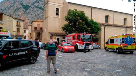Rescue vehicles gather in Civita on Monday.