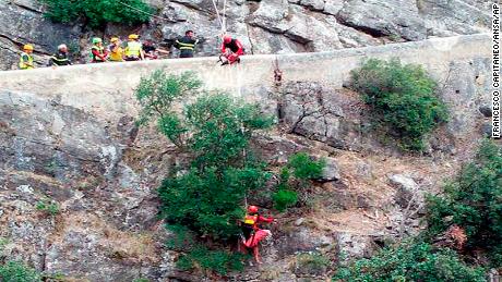 Rescue teams work at the gorge Monday in Pollino National Park. 