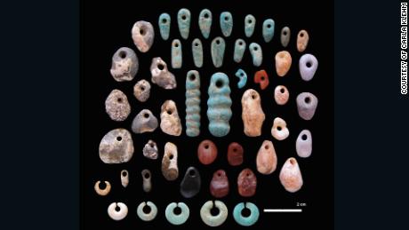   Stone pendants and earrings of the common cemetery of Lothagam North, Kenya. 