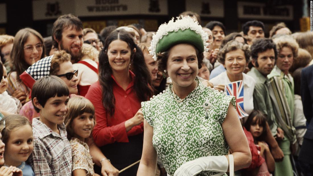 The Queen meets the crowds during her royal tour of New Zealand in 1977.