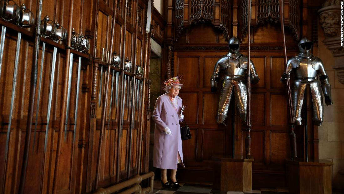 The Queen enters the Great Hall at Edinburgh Castle after attending a commemorative service for the Scottish National War Memorial in July 2014.