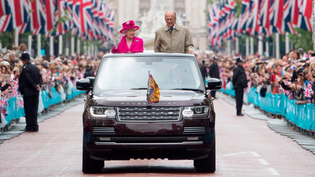 The Queen and Prince Philip wave to guests in London who were attending celebrations for her 90th birthday in 2016.