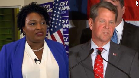 Brian Kemp, right, narrowly defeated Stacey Abrams in 2018 to become Georgia&#39;s governor in an election marred by allegations of vote suppression.