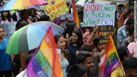 Indian supporters of the lesbian, gay, bisexual, transgender (LGBT) community hold placards as they participate in a pride parade in Chennai on June 24, 2018. (Photo by ARUN SANKAR / AFP)        (Photo credit should read ARUN SANKAR/AFP/Getty Images)