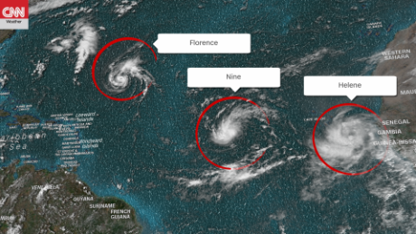 This image, taken around noon ET Saturday, shows Florence and two other storms in the Atlantic.