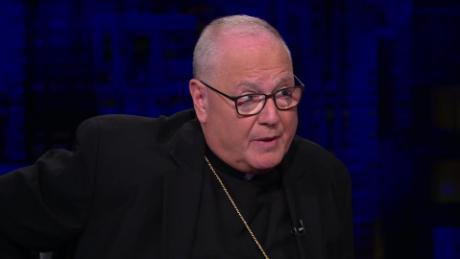 The American cardinal says that his own mother is embarrassed to be Catholic. 