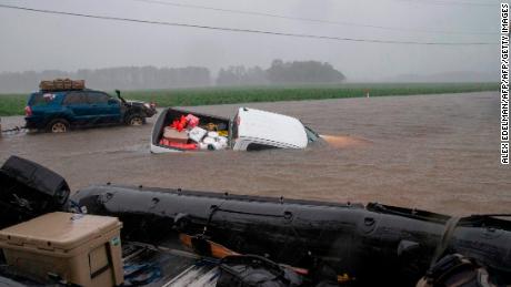 A van was submerged in floodwaters in Lumberton, North Carolina, on September 15, 2018, following Hurricane Florence.
