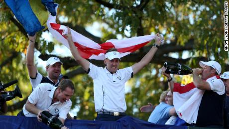 Poulter celebrates with European teammates after the &quot;Miracle at Medinah.&quot; 