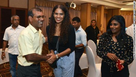 Former Maldivian President Mohamed Nasheed is congratulated by Solih's supporters in a Colombo hotel.