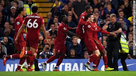 Liverpool celebrates Daniel Sturridge&#39;s late equalizer.