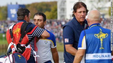 Phil Mickelson concedes the match that confirmed a European triumph. 