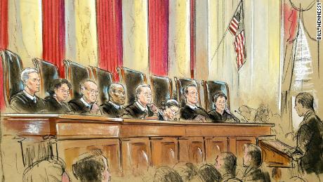 An empty space and an inactive microphone: the Supreme Court returns