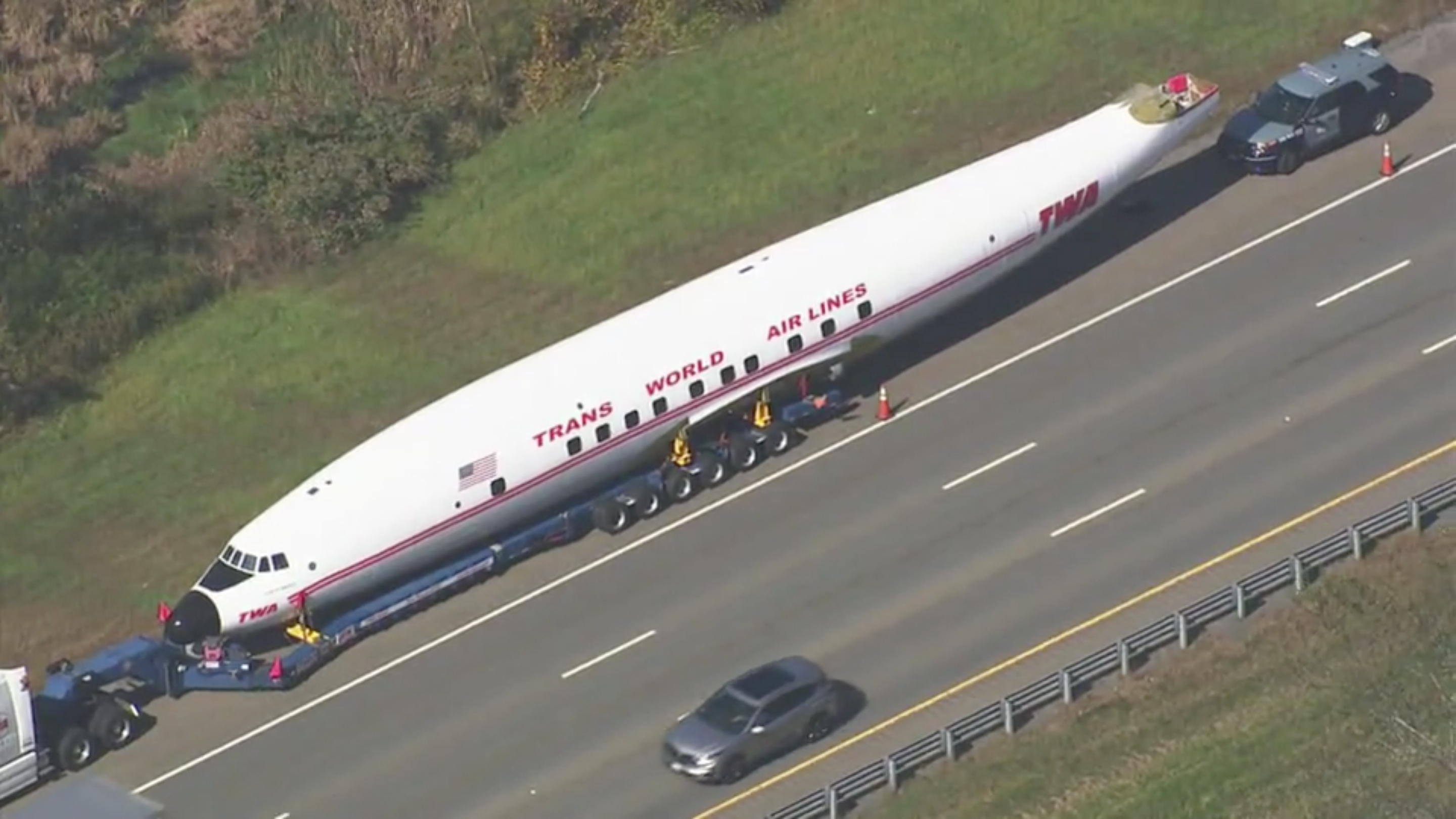A Vintage Airplane Is Taking A Highway To Jfk