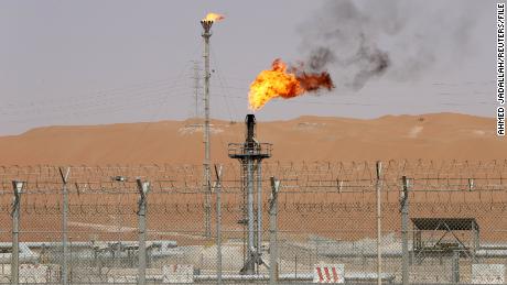 Flames are seen at the production facility of Saudi Aramco's Shaybah oilfield in the Empty Quarter, Saudi Arabian on May 22, 2018.