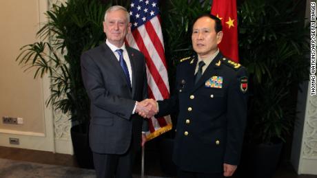 US Secretary of Defense Jim Mattis shakes hands with his Chinese counterpart, General Wei Fenghe, in Singapore on October 18th.