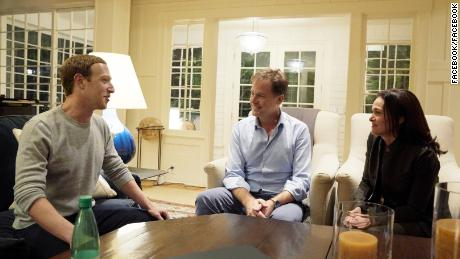 An undated handout from Facebook shows Zuckerberg and Sandberg meeting with Clegg. 