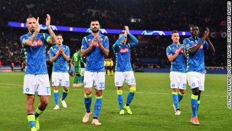 Napoli players applaud  fans after an impressive performance in the Champions League. 