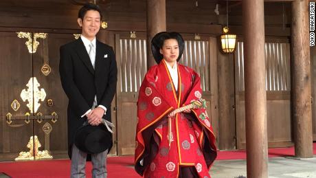 Japanese Princess Ayako and new husband Kei Moriya address reporters after their wedding ceremony at the Meiji Shrine in Tokyo on October 29, 2018. 