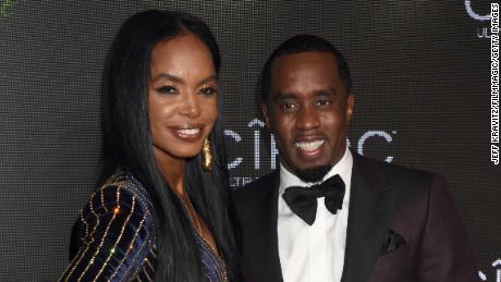 Kim Porter and Sean artist recording "Diddy" Combs.