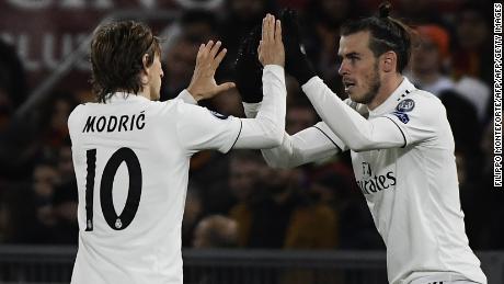 Gareth Bale, right, is marked by Luka Modric after scoring for Real Madrid against Roma. 