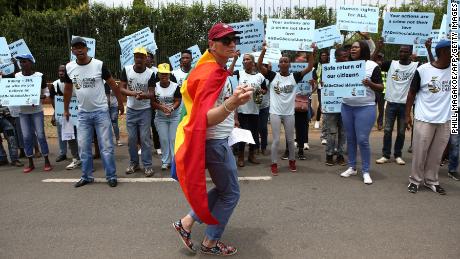 South African members of the LGBTQI community protest outside the Tanzania High Commission.