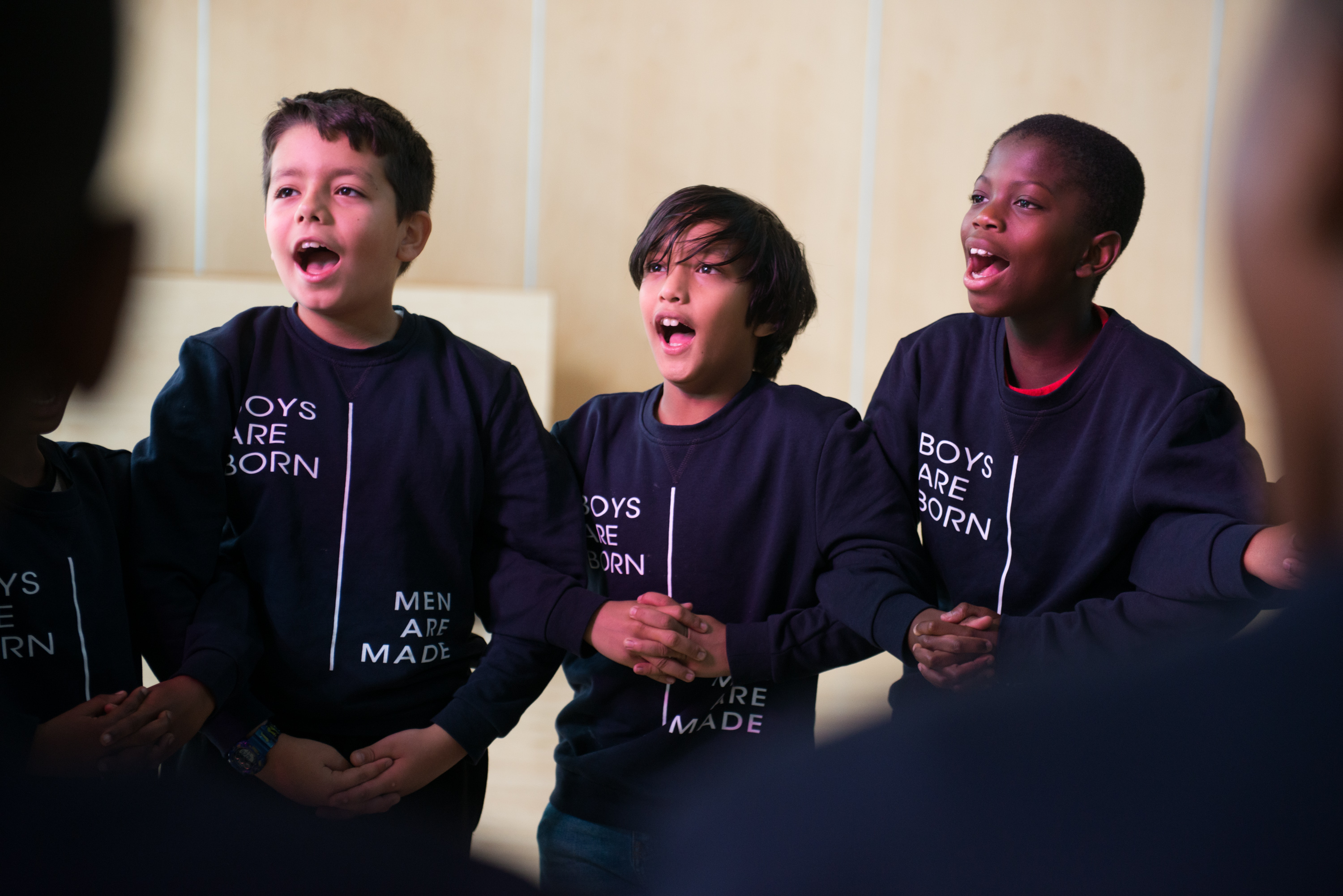 Manhood Academy boys chant the program&#39;s mantra, &quot;Boys are born! Men are made!&quot; at the beginning of a session in October.