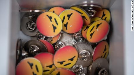   Pins are sitting in a container at the first appearance of Facebook's privacy on the United States. 