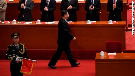 China&#39;s President Xi Jinping arrives for a celebration meeting marking the 40th anniversary of China&#39;s reform and opening up in Beijing on December 18.