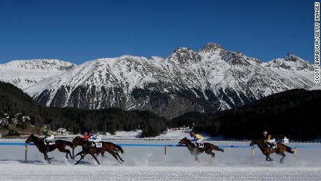 ST. MORITZ, SWITZERLAND - FEBRUARY 04:  Horses race over the snow during the sixth race of the White Turf race meeting held on the frozen surface of Lake St. Moritz on February 4, 2007 in St. Moritz, Switzerland. The White Turf meetings are held on three consecutive Sundays in February each year. This year, the international horse races of St. Moritz are celebrating their 100th anniversary. (Photo by Scott Barbour/Getty Images)